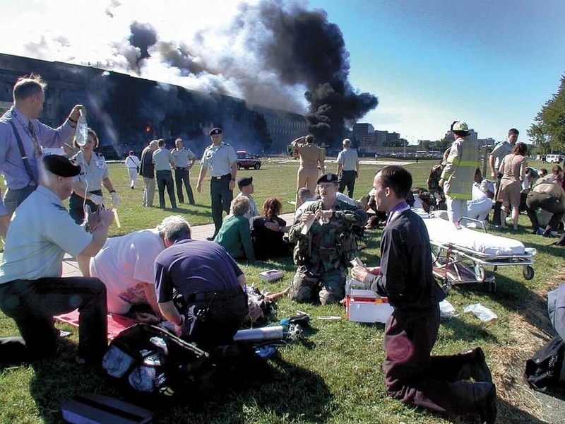 Fr. Mcgraw prays with victims of the Pentagon attack on 9/11/2001