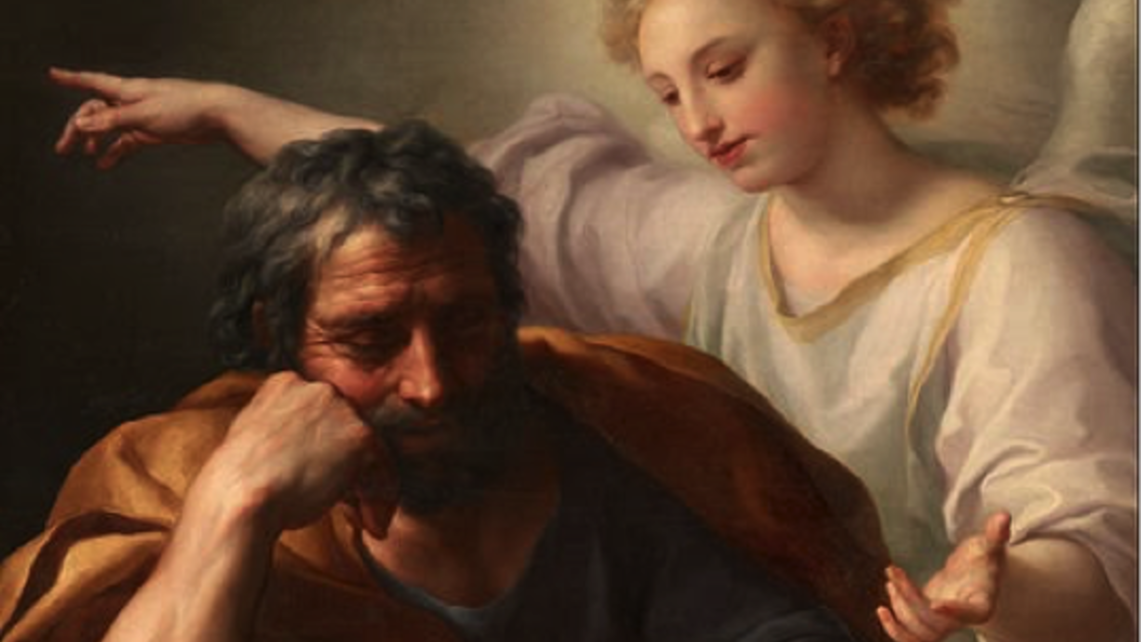 St. Joseph sits in thought with an Angel