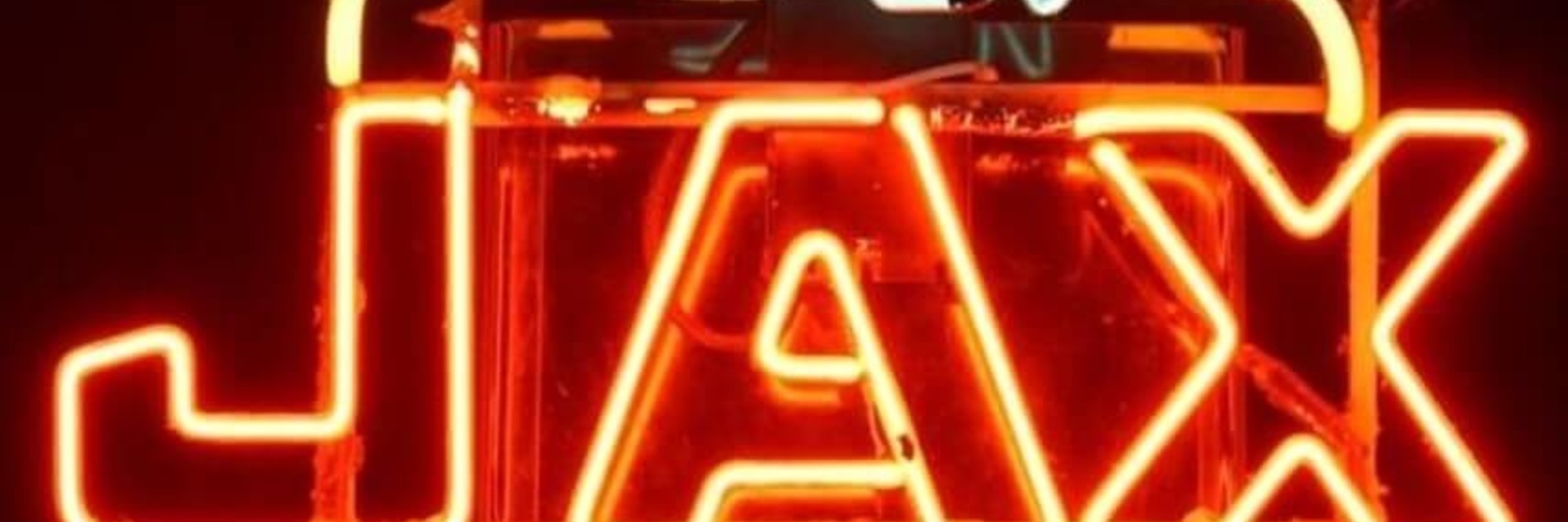 neon sign advertising JAX beer