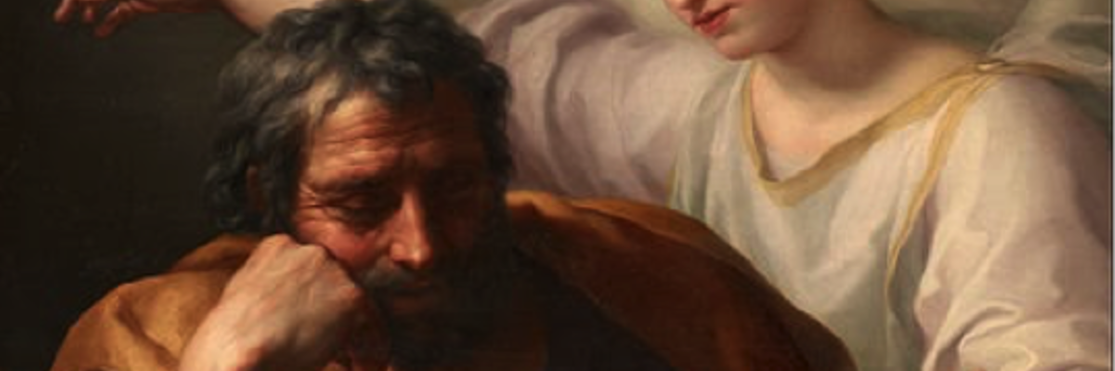 St. Joseph sits in thought with an Angel